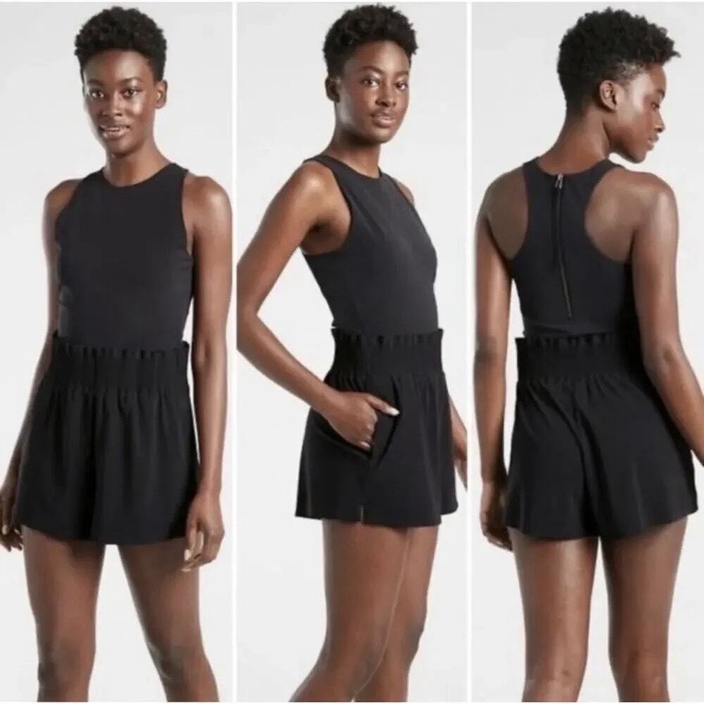 Athleta Cosmic Flutter Romper Size Large Black Sleeveless Ruffle Pockets